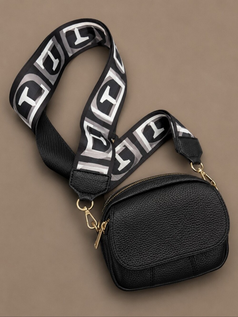 Black Pebbled Leather Crossbody with Graphic Strap